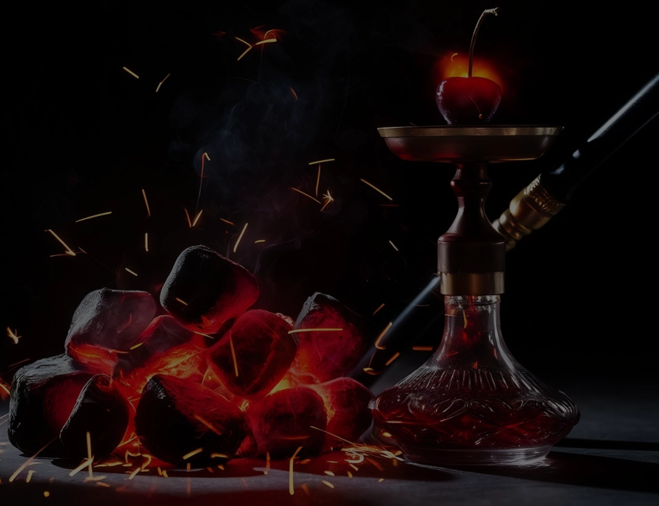 Hookah charcoal glowing vibrantly beneath a decorative cherry, creating a luxurious and premium ambiance.